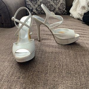 Worn silver beaded heels